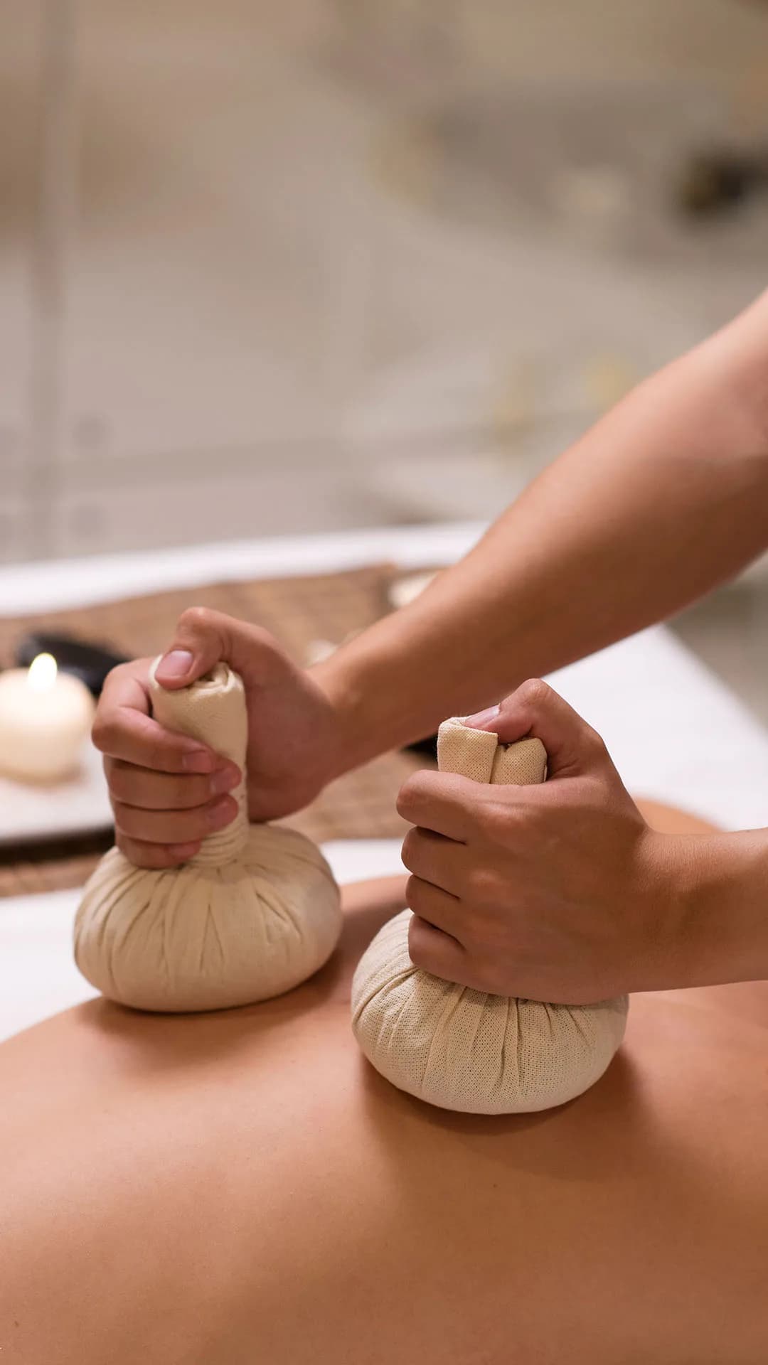 Warm herbal compresses worked along the back